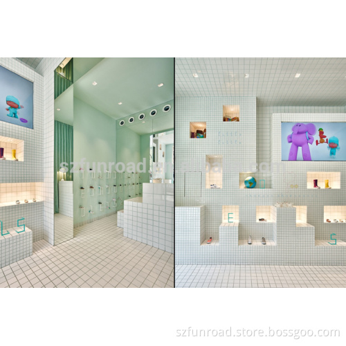Kid shoes retail shop decoration with built-in display cases and countertop displays